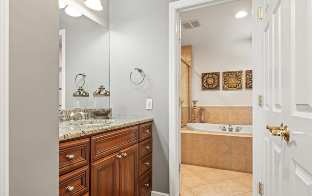 bathroom featuring visible vents, a shower with shower door, vanity, tile patterned flooring, and a bath