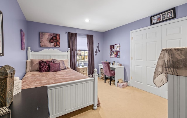 bedroom featuring a closet and carpet flooring