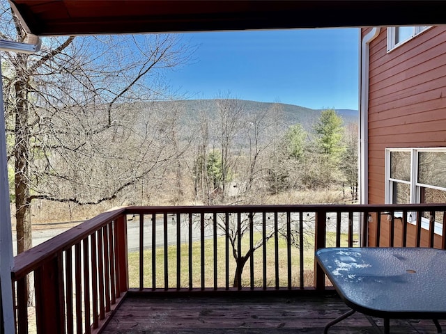 balcony featuring a mountain view