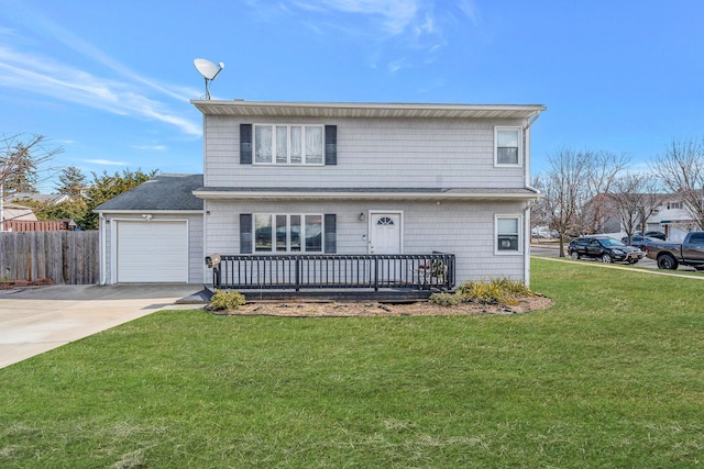 traditional home with a garage, driveway, a front yard, and fence