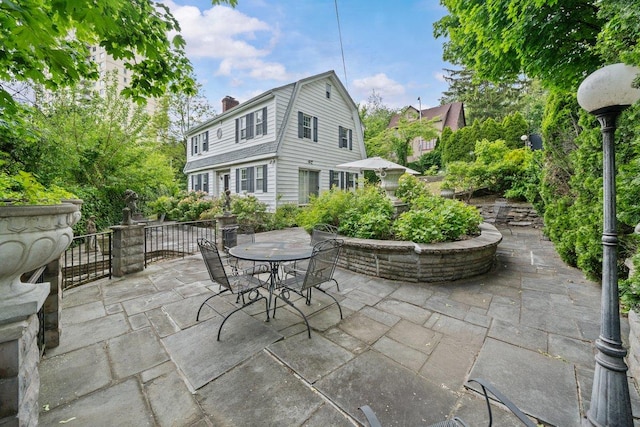 2711 Edgehill Ave, Bronx, NY 10463 - view of patio featuring outdoor dining area