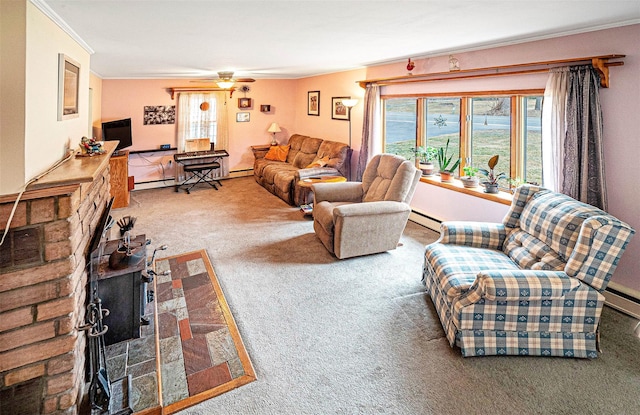 living room featuring a baseboard radiator, carpet, a wealth of natural light, and crown molding