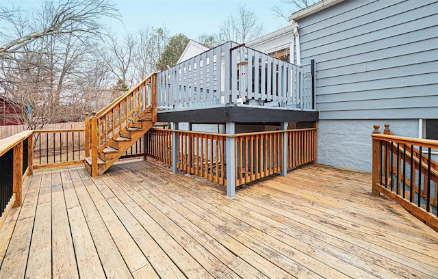 wooden deck featuring fence