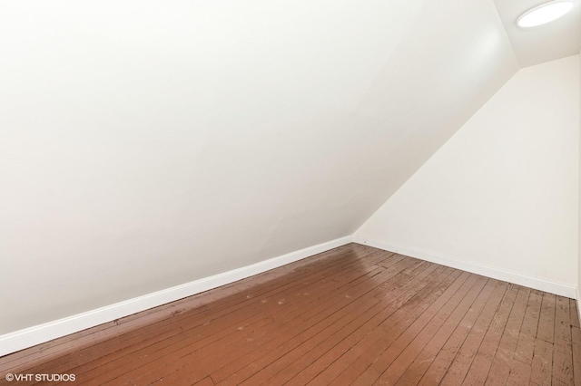 details with baseboards and wood finished floors