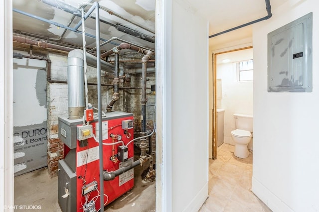 utility room with electric panel and a heating unit