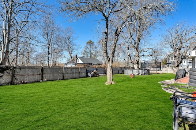 view of yard featuring a fenced backyard