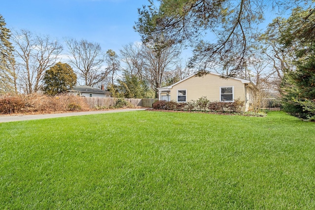 view of yard featuring fence