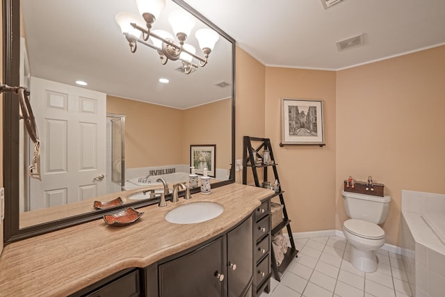 bathroom featuring visible vents, toilet, vanity, baseboards, and tile patterned floors