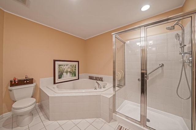 full bathroom featuring a stall shower, tile patterned flooring, a garden tub, and toilet