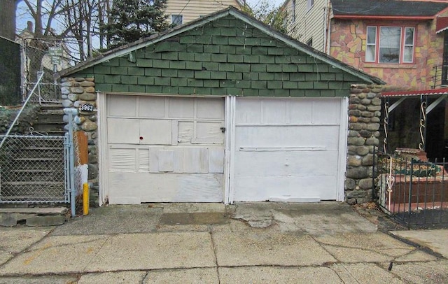 detached garage with fence