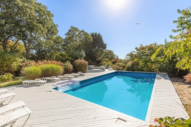 pool featuring a wooden deck