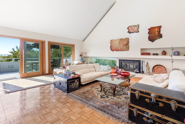 29 Kenwood Rd, Southampton, NY 11968 - living room with high vaulted ceiling and a glass covered fireplace