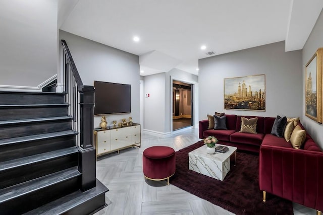 living room with baseboards, stairs, visible vents, and recessed lighting