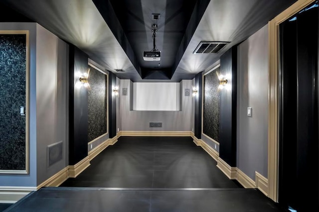 home theater with visible vents and baseboards