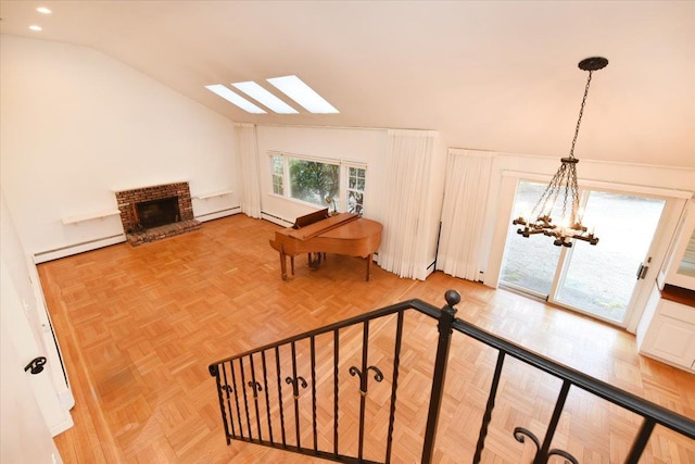 bonus room with lofted ceiling with skylight, a chandelier, a fireplace, and baseboard heating