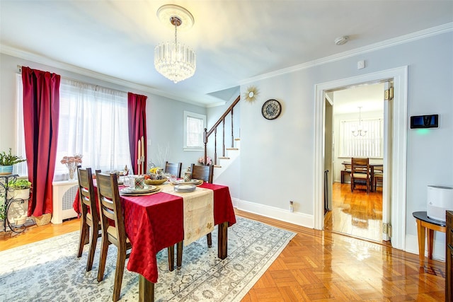 dining area with stairs, crown molding, baseboards, and a notable chandelier