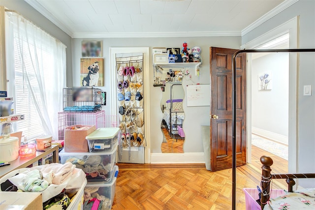 interior space with baseboards and ornamental molding