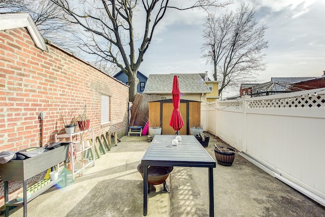 view of patio with a fenced backyard