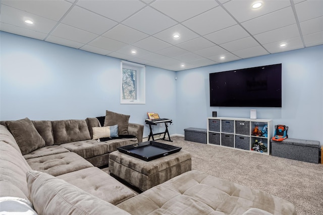 living room with carpet floors, recessed lighting, and baseboards