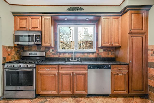 182-37 Radnor Rd, Jamaica Estates, NY 11432 - kitchen featuring decorative backsplash, dark stone counters, stainless steel appliances, and a sink