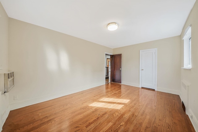 182-37 Radnor Rd, Jamaica Estates, NY 11432 - empty room with baseboards and wood finished floors