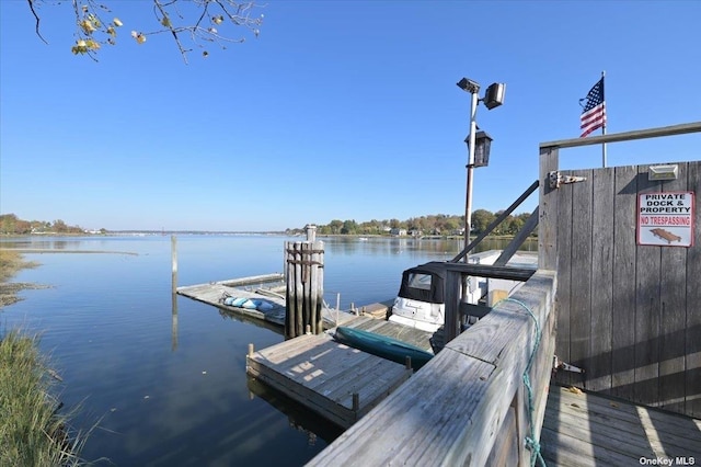 view of dock with a water view