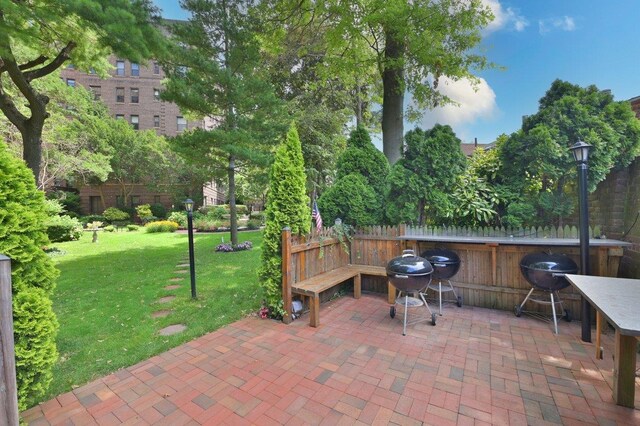 view of patio featuring fence