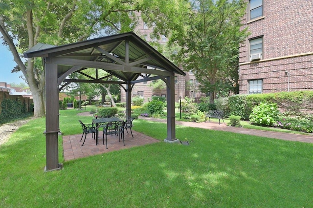 surrounding community featuring a yard and a gazebo