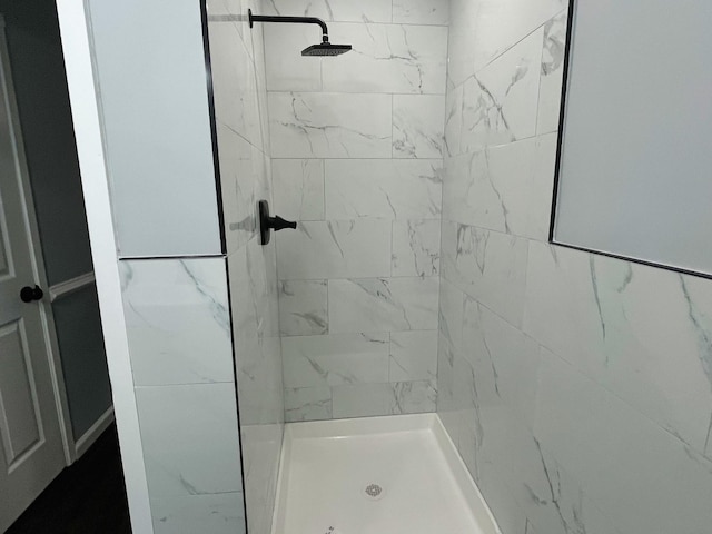 full bath featuring a stall shower