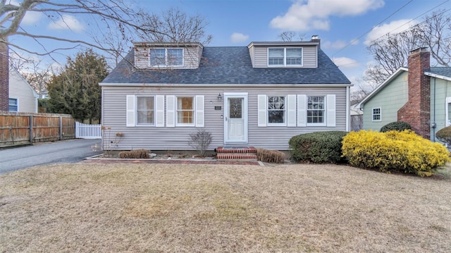 5225 Peconic Bay Blvd, Laurel, NY 11948 - view of front of house featuring a front yard, fence, and roof with shingles