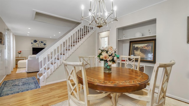 5225 Peconic Bay Blvd, Laurel, NY 11948 - dining area with baseboards, stairway, and wood finished floors