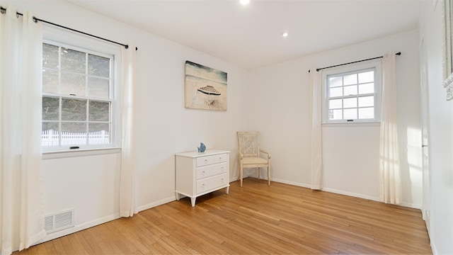 5225 Peconic Bay Blvd, Laurel, NY 11948 - unfurnished room with light wood finished floors, recessed lighting, visible vents, and baseboards