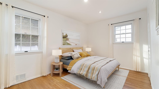 5225 Peconic Bay Blvd, Laurel, NY 11948 - bedroom with recessed lighting, baseboards, visible vents, and light wood finished floors