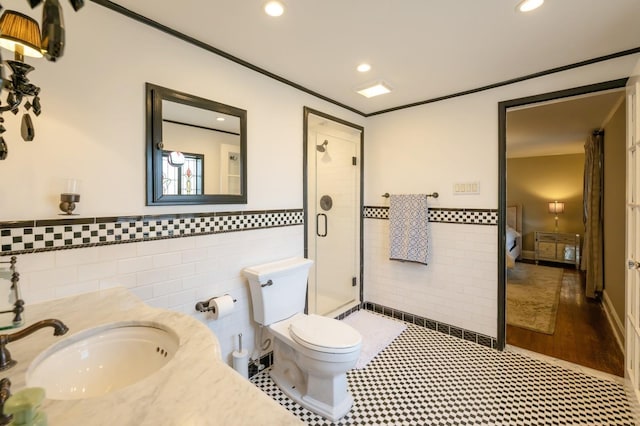 full bath featuring ornamental molding, a stall shower, tile walls, and recessed lighting