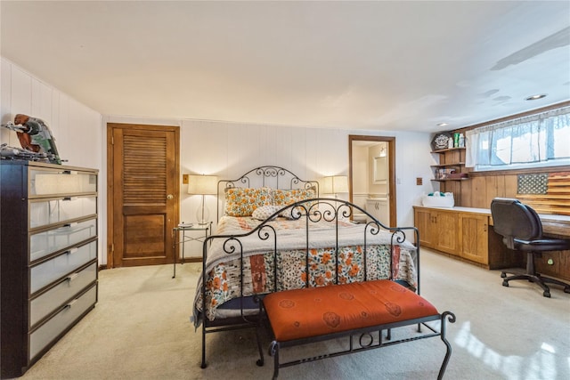 bedroom featuring light colored carpet