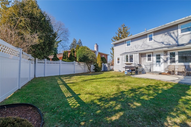 view of yard featuring a fenced backyard and a patio