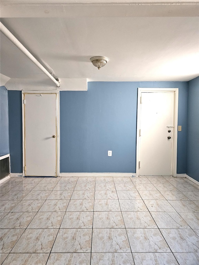 30-32 84th St, East Elmhurst, NY 11370 - empty room featuring baseboards