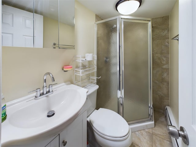 full bathroom featuring a baseboard heating unit, tile patterned flooring, a shower stall, and vanity