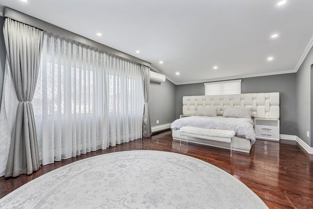 bedroom featuring a baseboard radiator, baseboards, ornamental molding, and dark wood finished floors