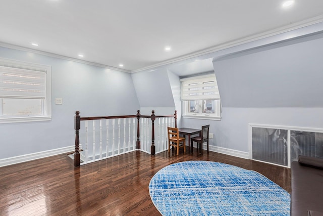 living area with dark wood-type flooring, baseboards, ornamental molding, and an upstairs landing