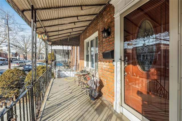 wooden deck with a porch