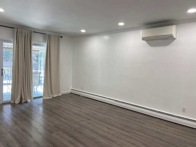 unfurnished room featuring a baseboard heating unit, ornamental molding, a wall unit AC, and dark wood finished floors