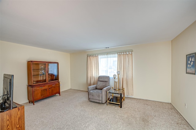 living area with carpet flooring