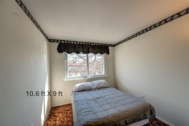 bedroom featuring carpet