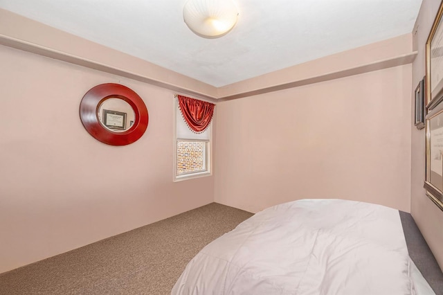 unfurnished bedroom with carpet flooring