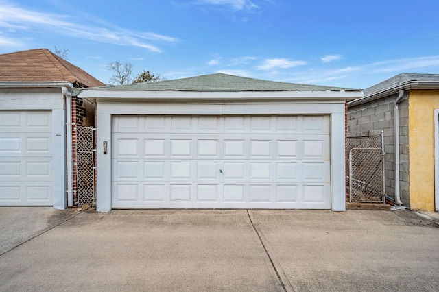 garage with fence