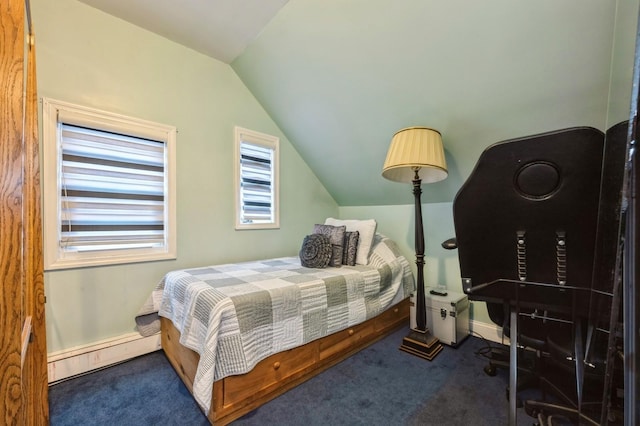 carpeted bedroom featuring a baseboard heating unit and vaulted ceiling