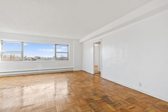 spare room with a baseboard radiator