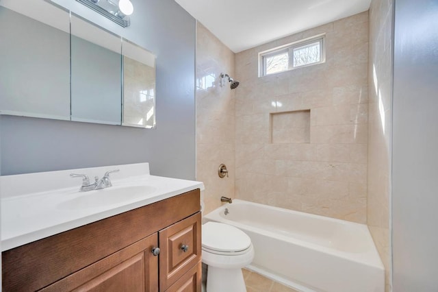 full bath with tile patterned flooring, tub / shower combination, vanity, and toilet