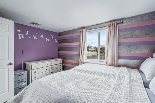 bedroom with visible vents